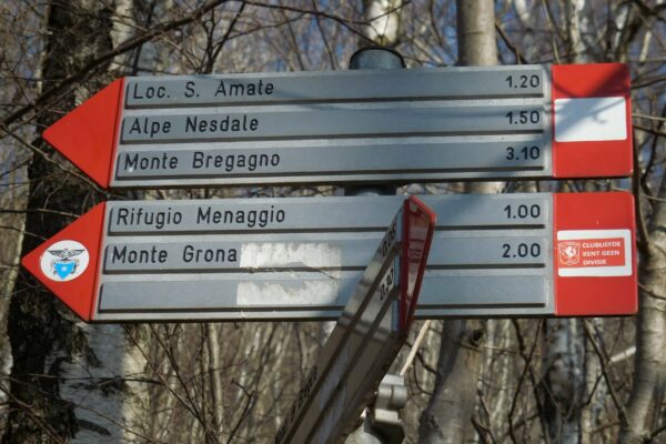 trail signs along the path to Monte Bregagno